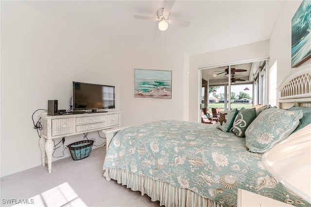 bedroom featuring carpet, access to exterior, and ceiling fan