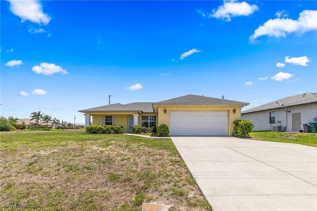 706 Kismet Pkwy E, Cape Coral, FL 33909 - ranch-style home with an attached garage, concrete driveway, stucco siding, a front yard, and central AC