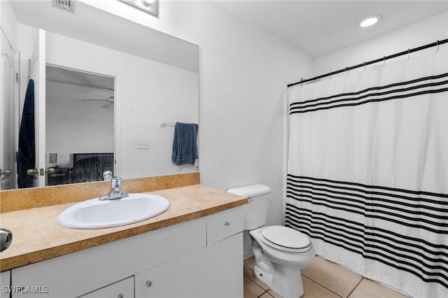 706 Kismet Pkwy E, Cape Coral, FL 33909 - full bath with vanity, toilet, tile patterned flooring, and curtained shower