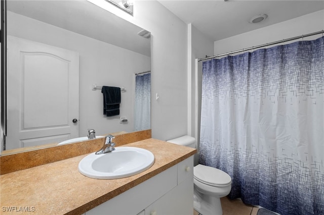 706 Kismet Pkwy E, Cape Coral, FL 33909 - full bathroom with vanity, toilet, and a shower with shower curtain