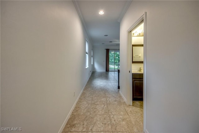 19530 Bowring Park Rd Unit 106, Fort Myers, FL 33967 - hallway with crown molding, baseboards, a sink, and recessed lighting