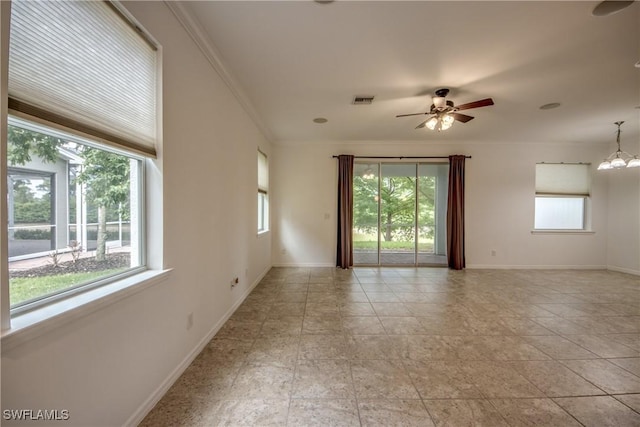 19530 Bowring Park Rd Unit 106, Fort Myers, FL 33967 - empty room featuring healthy amount of natural light, baseboards, ceiling fan, and crown molding