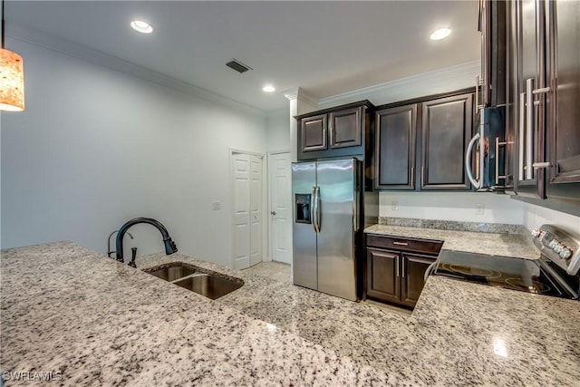 19530 Bowring Park Rd Unit 106, Fort Myers, FL 33967 - kitchen with appliances with stainless steel finishes, a sink, ornamental molding, dark brown cabinetry, and light stone counters