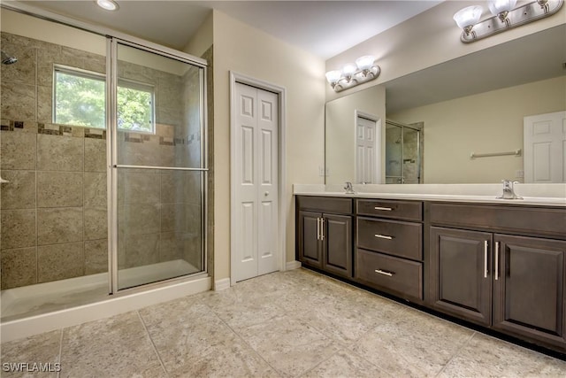 19530 Bowring Park Rd Unit 106, Fort Myers, FL 33967 - bathroom featuring a stall shower, double vanity, and tile patterned floors
