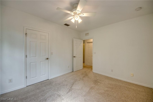 19530 Bowring Park Rd Unit 106, Fort Myers, FL 33967 - unfurnished bedroom featuring light carpet, baseboards, and ceiling fan