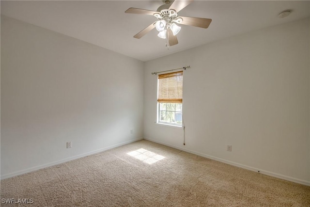 19530 Bowring Park Rd Unit 106, Fort Myers, FL 33967 - spare room featuring carpet, baseboards, ceiling fan, and a smoke detector