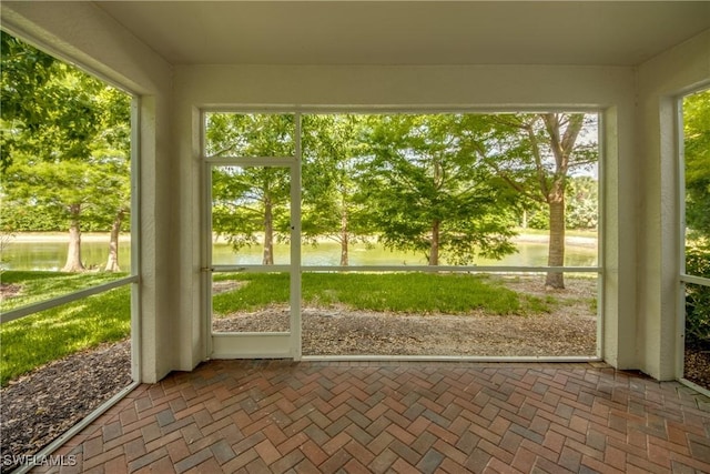 19530 Bowring Park Rd Unit 106, Fort Myers, FL 33967 - unfurnished sunroom with a water view