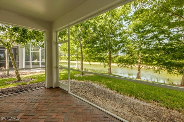 19530 Bowring Park Rd Unit 106, Fort Myers, FL 33967 - unfurnished sunroom with a water view