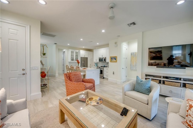 9373 Aviano Dr, Fort Myers, FL 33913 - living area with light wood-type flooring and recessed lighting
