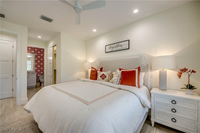 9373 Aviano Dr, Fort Myers, FL 33913 - bedroom with light wood finished floors, ensuite bathroom, recessed lighting, and a ceiling fan
