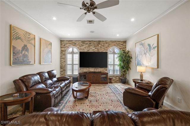 living area featuring a ceiling fan, crown molding, baseboards, wood finished floors, and recessed lighting