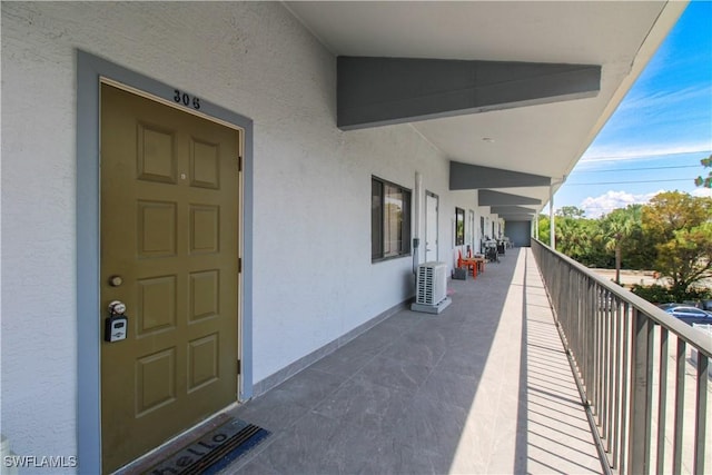 826 Wiggins Pass Rd Unit 306, Naples, FL 34110 - balcony featuring a cooling unit