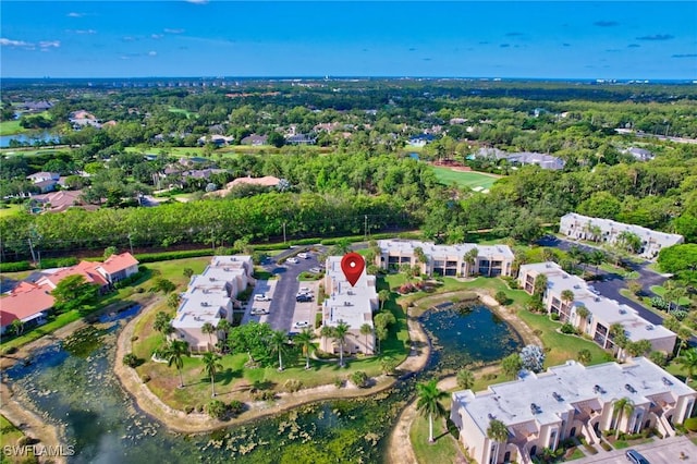 aerial view of property's location featuring a nearby body of water