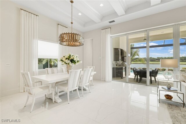 18492 Miromar Lakes Blvd W, Miromar Lakes, FL 33913 - dining area with a chandelier, beam ceiling, light marble finish floors, recessed lighting, and a water view
