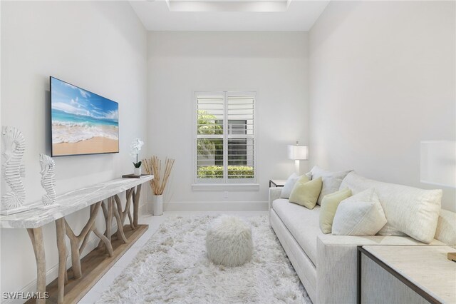 18492 Miromar Lakes Blvd W, Miromar Lakes, FL 33913 - living room featuring baseboards