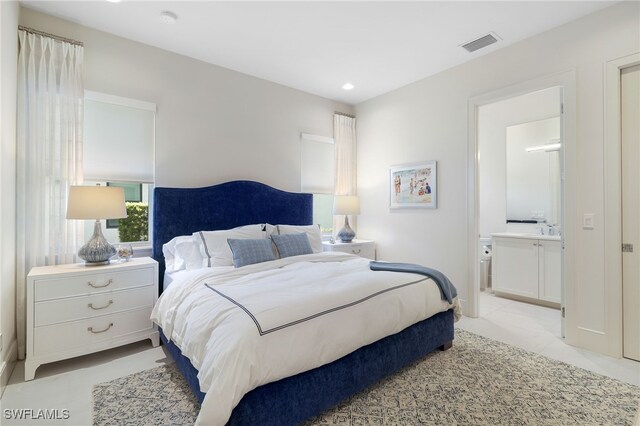 18492 Miromar Lakes Blvd W, Miromar Lakes, FL 33913 - bedroom with ensuite bath, recessed lighting, and light tile patterned floors
