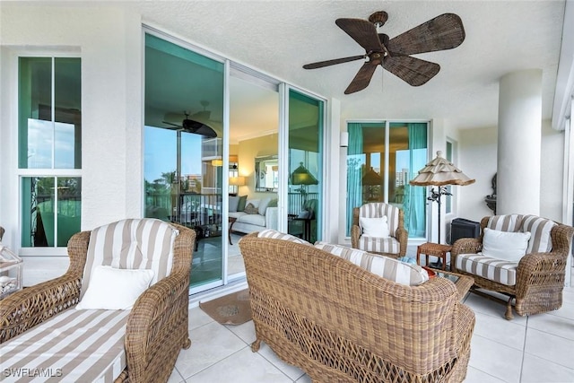 315 Dunes Blvd Unit 307, Naples, FL 34110 - view of patio / terrace featuring a ceiling fan and an outdoor hangout area