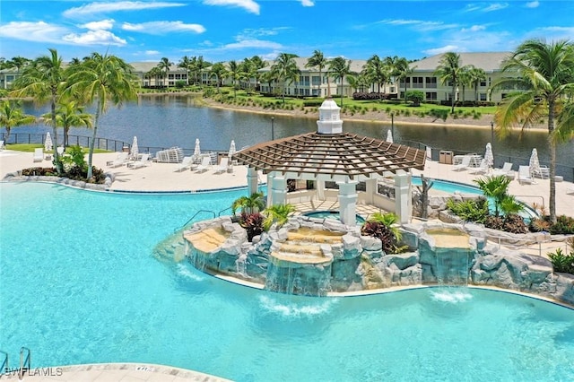 315 Dunes Blvd Unit 307, Naples, FL 34110 - community pool with a gazebo, fence, a residential view, and a water view