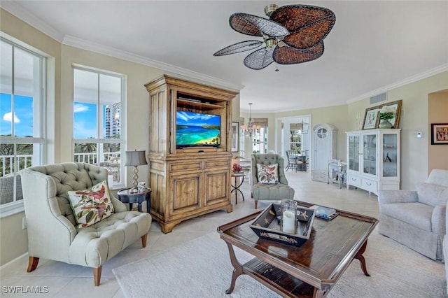 315 Dunes Blvd Unit 307, Naples, FL 34110 - living area with light tile patterned floors, ceiling fan, ornamental molding, a chandelier, and baseboards
