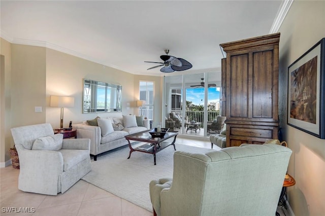 315 Dunes Blvd Unit 307, Naples, FL 34110 - living room featuring crown molding, light tile patterned floors, ceiling fan, and baseboards