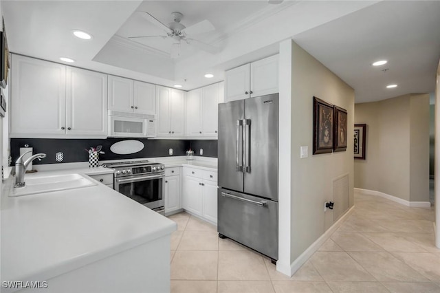 315 Dunes Blvd Unit 307, Naples, FL 34110 - kitchen featuring stainless steel appliances, a sink, light tile patterned flooring, a ceiling fan, and recessed lighting