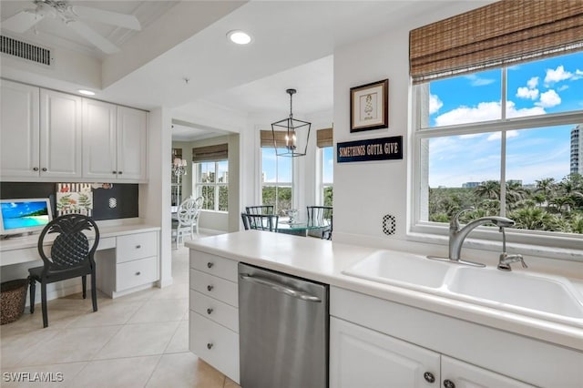 315 Dunes Blvd Unit 307, Naples, FL 34110 - kitchen with dishwasher, a sink, recessed lighting, white cabinetry, and light tile patterned flooring
