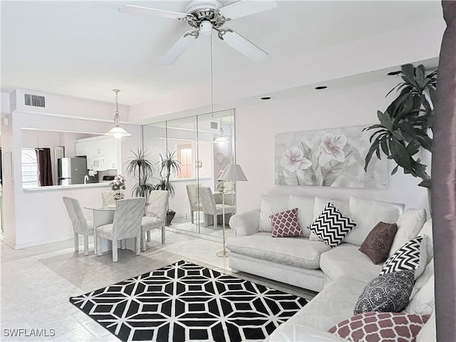 1096 Woodshire Ln Unit C205, Naples, FL 34105 - living area featuring ceiling fan