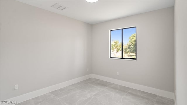 212 Connecticut Rd, Lehigh Acres, FL 33936 - empty room with light marble finish floors and baseboards