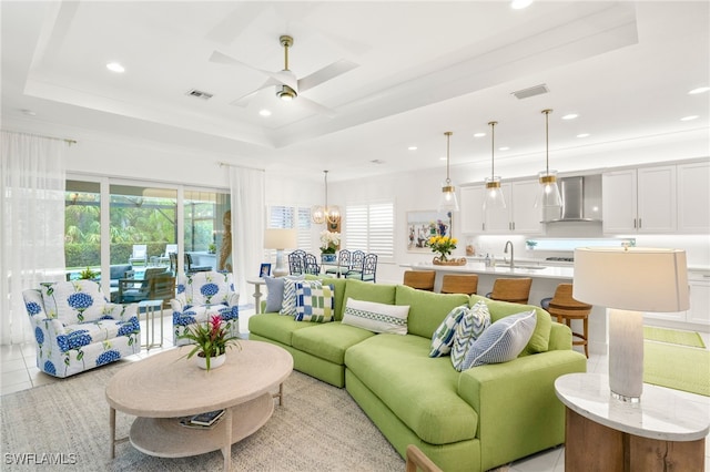 11521 Coronado Way, Naples, FL 34120 - living room featuring ceiling fan, a tray ceiling, recessed lighting, and light tile patterned floors
