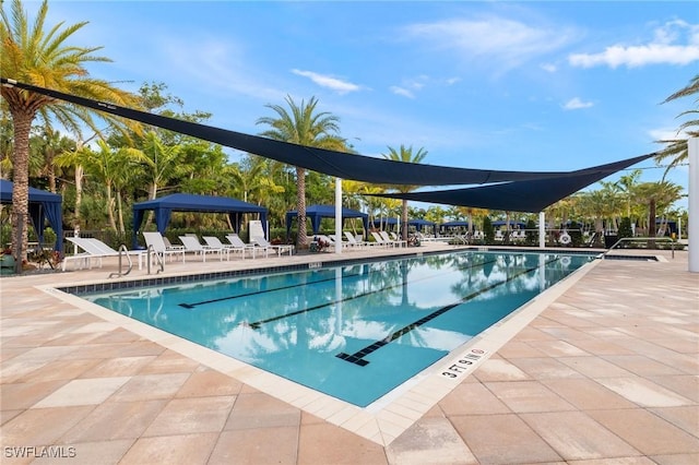 11521 Coronado Way, Naples, FL 34120 - community pool featuring a gazebo and a patio