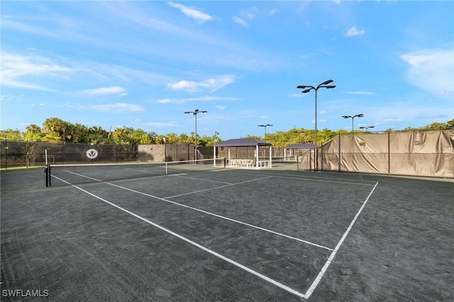 11521 Coronado Way, Naples, FL 34120 - view of tennis court with fence