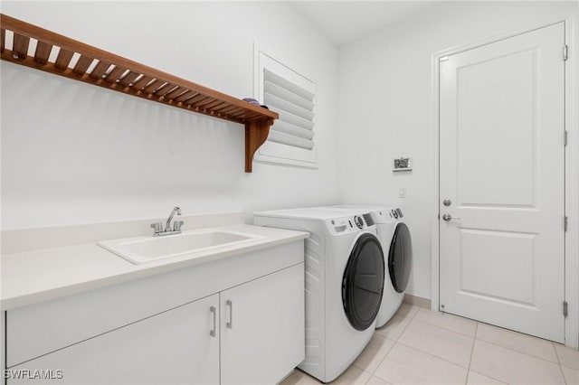11521 Coronado Way, Naples, FL 34120 - washroom with independent washer and dryer, a sink, light tile patterned floors, and baseboards