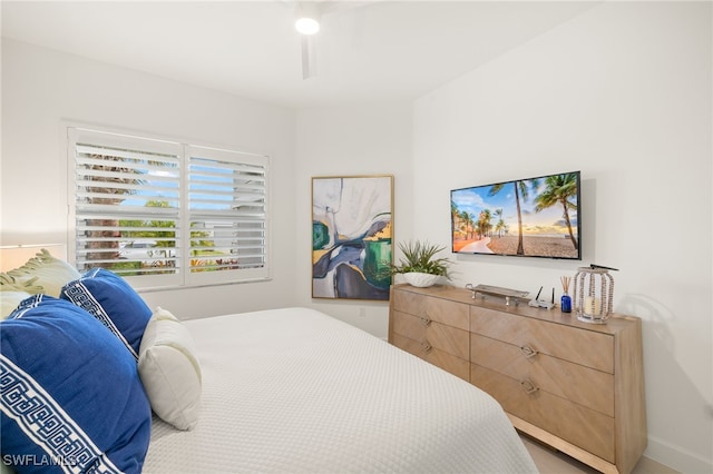 11521 Coronado Way, Naples, FL 34120 - bedroom with ceiling fan and baseboards