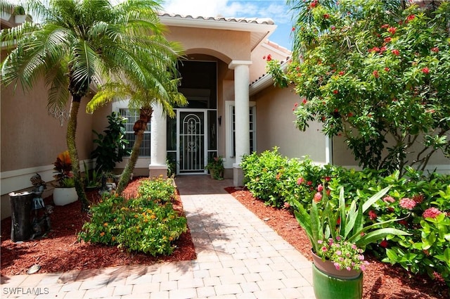 20408 Foxworth Cir, Estero, FL 33928 - entrance to property with stucco siding