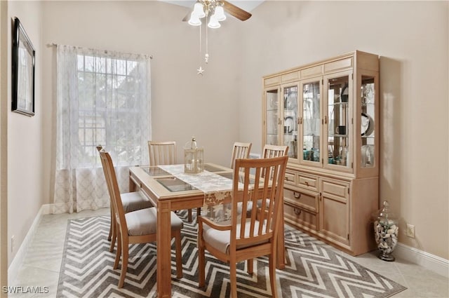 20408 Foxworth Cir, Estero, FL 33928 - dining space with a ceiling fan, baseboards, and light tile patterned floors