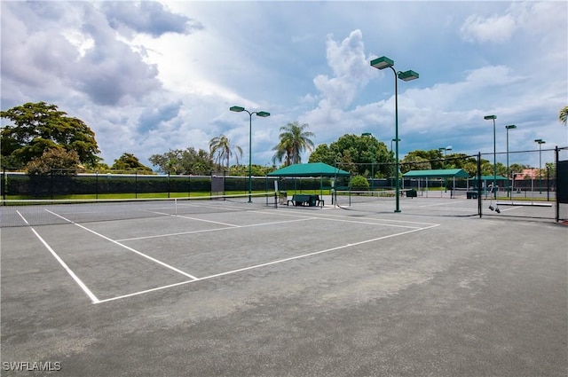 20408 Foxworth Cir, Estero, FL 33928 - view of tennis court with fence and community basketball court