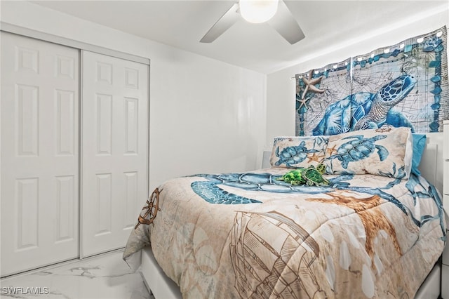 4411 Rose St, Valrico, FL 33596 - bedroom with marble finish floors, a ceiling fan, and a closet