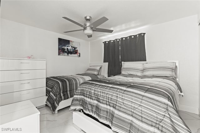 4411 Rose St, Valrico, FL 33596 - bedroom with light marble finish floors, a ceiling fan, and baseboards