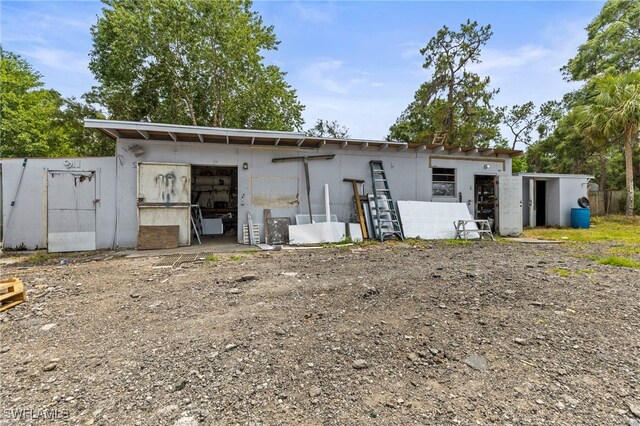 4411 Rose St, Valrico, FL 33596 - back of property with an outdoor structure