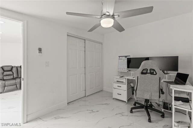 4411 Rose St, Valrico, FL 33596 - office space with light marble finish floors, baseboards, and a ceiling fan