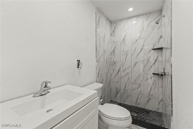 4411 Rose St, Valrico, FL 33596 - full bath with toilet, a marble finish shower, vanity, and recessed lighting