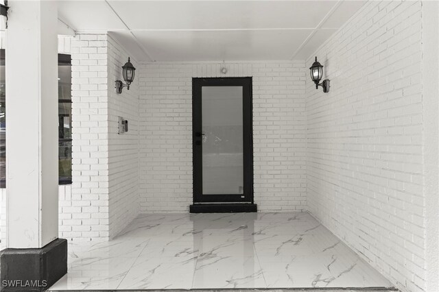 4411 Rose St, Valrico, FL 33596 - property entrance featuring brick siding