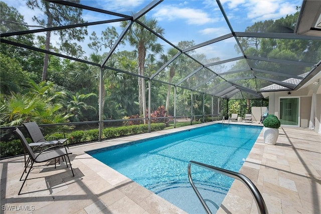 2026 Merlin Ct, Naples, FL 34105 - swimming pool featuring a patio