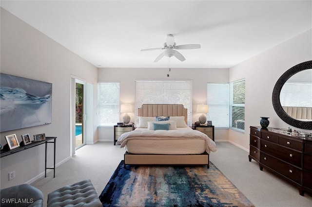 2026 Merlin Ct, Naples, FL 34105 - carpeted bedroom with baseboards, access to outside, and multiple windows