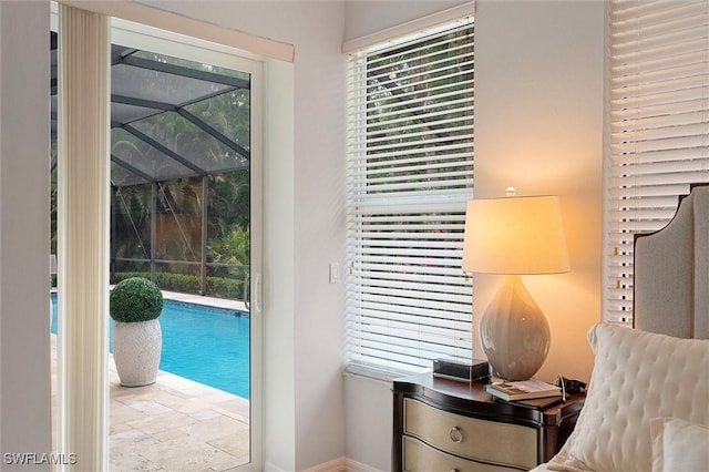 2026 Merlin Ct, Naples, FL 34105 - office featuring plenty of natural light, stone tile flooring, and baseboards