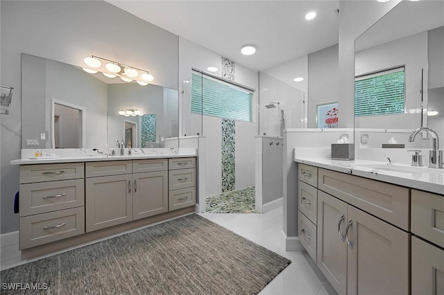 2026 Merlin Ct, Naples, FL 34105 - full bathroom featuring walk in shower, two vanities, and tile patterned floors