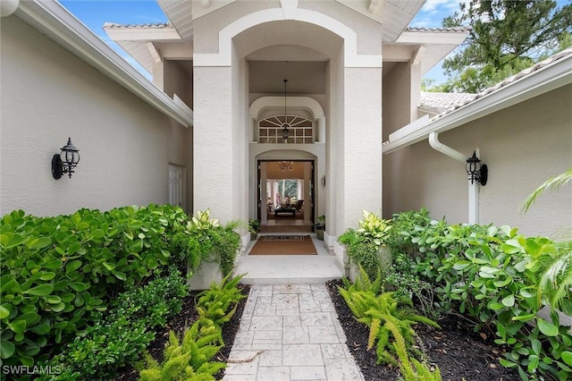 2026 Merlin Ct, Naples, FL 34105 - doorway to property featuring stucco siding