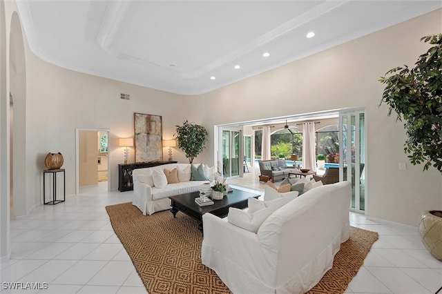 2026 Merlin Ct, Naples, FL 34105 - living area featuring a high ceiling, light tile patterned flooring, recessed lighting, french doors, and baseboards