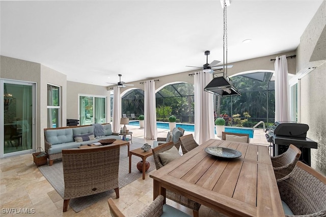 2026 Merlin Ct, Naples, FL 34105 - view of patio featuring a ceiling fan, an outdoor living space, an outdoor pool, and outdoor dining space