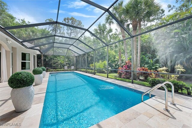 2026 Merlin Ct, Naples, FL 34105 - swimming pool featuring a patio area and a lanai